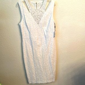 White lace Calvin Klein dress, size 14. Cut outs on shoulders w/beautiful lace
